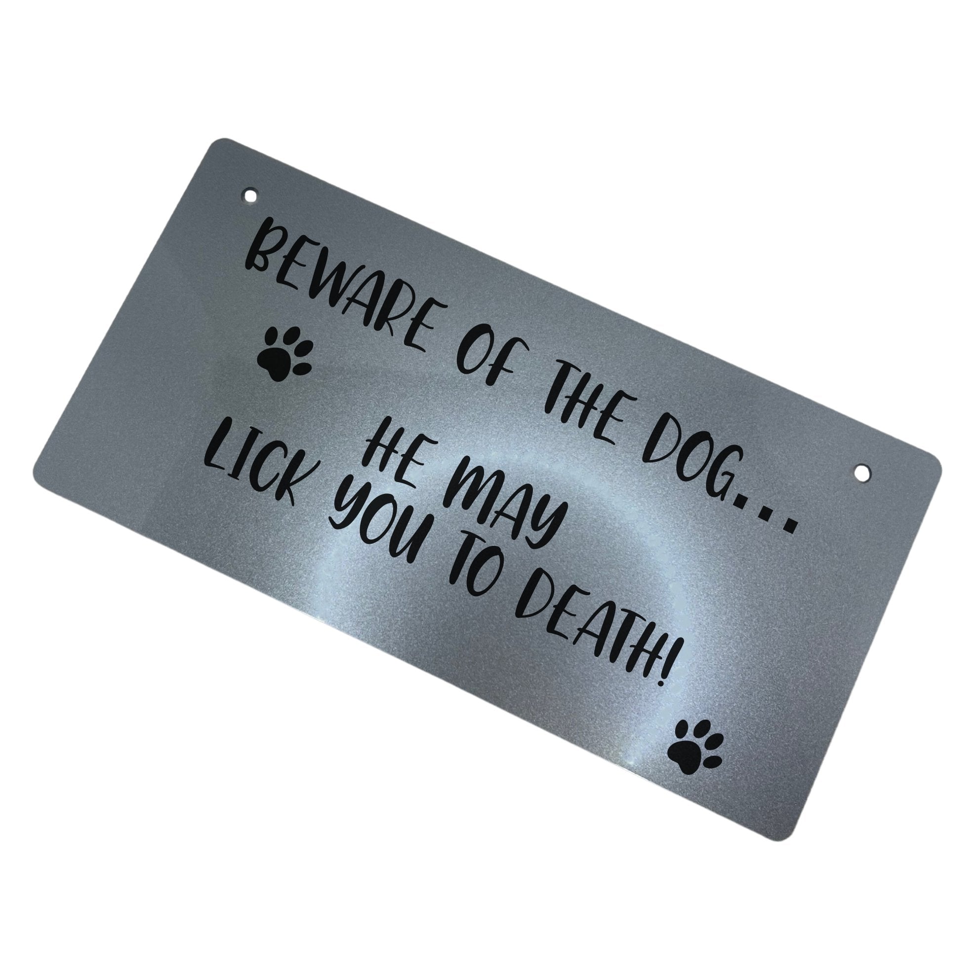 Capturing attention with its laser-engraved inscription, 'Beware Of The Dog - He May Lick You To Death', this acrylic sign stands as a testament to its durability. Presented in elegant gold or silver, it infuses humor into any setting, leaving a lasting impression on all who come across it.