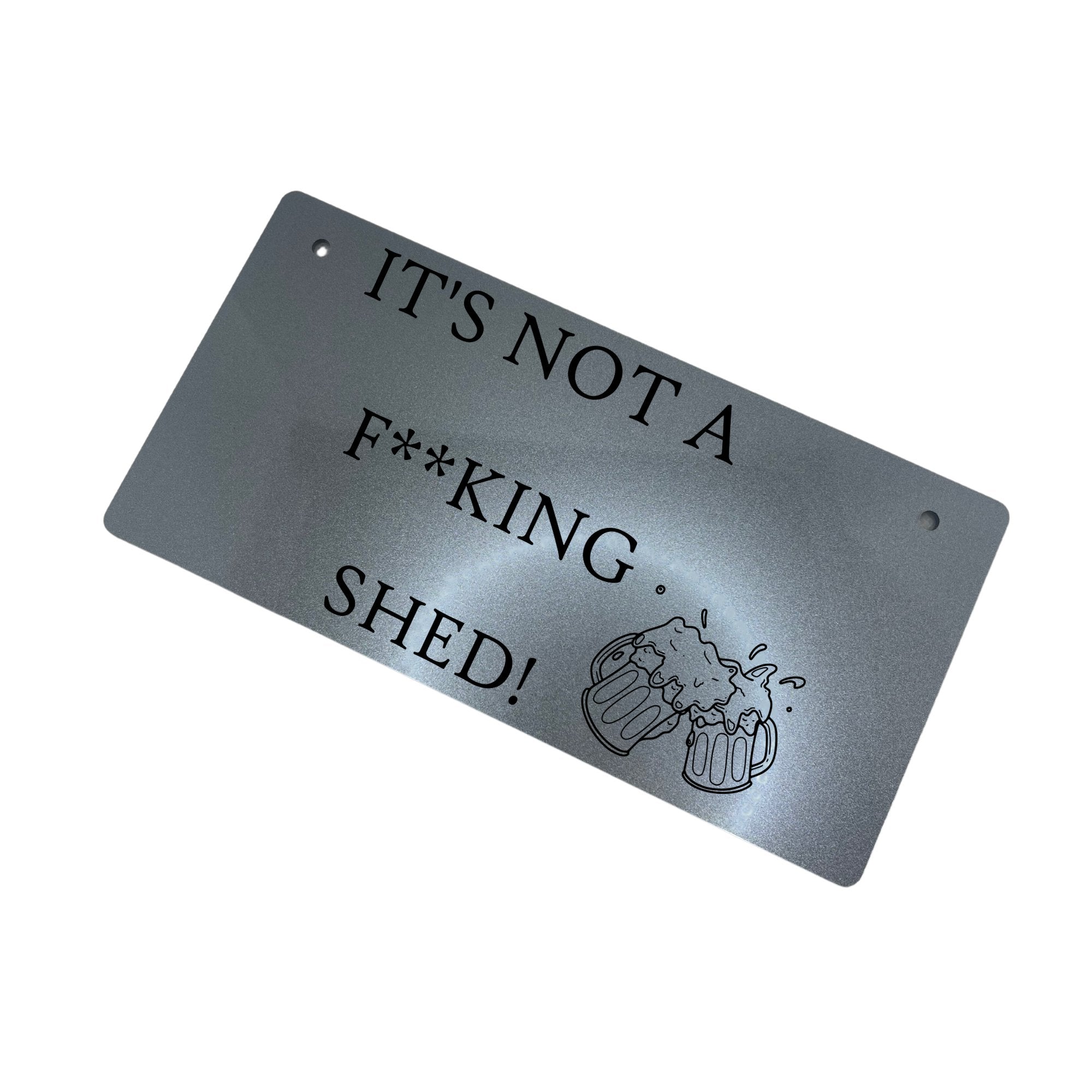 A high-quality acrylic sign with engraved beer glasses design, reading 'IT'S NOT A F**KING SHED', in a choice of elegant gold or sleek silver.