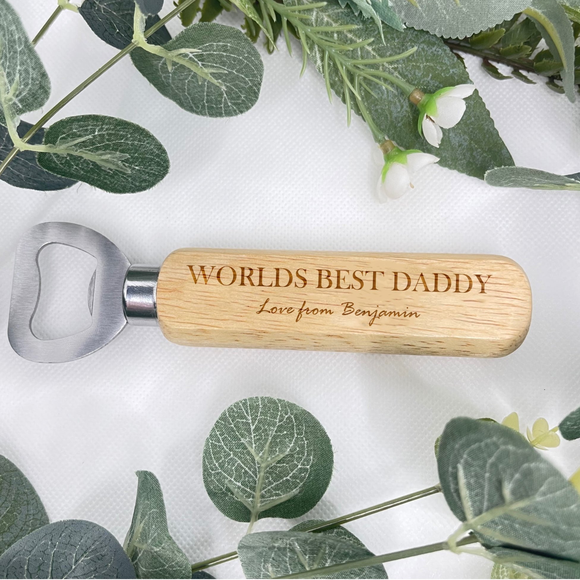Personalised laser-engraved wood bottle opener with metal accent, featuring a unique design for easy use. Customizable with your own writing on the top and bottom, making it a perfect gift for weddings, birthdays, and Christmas.