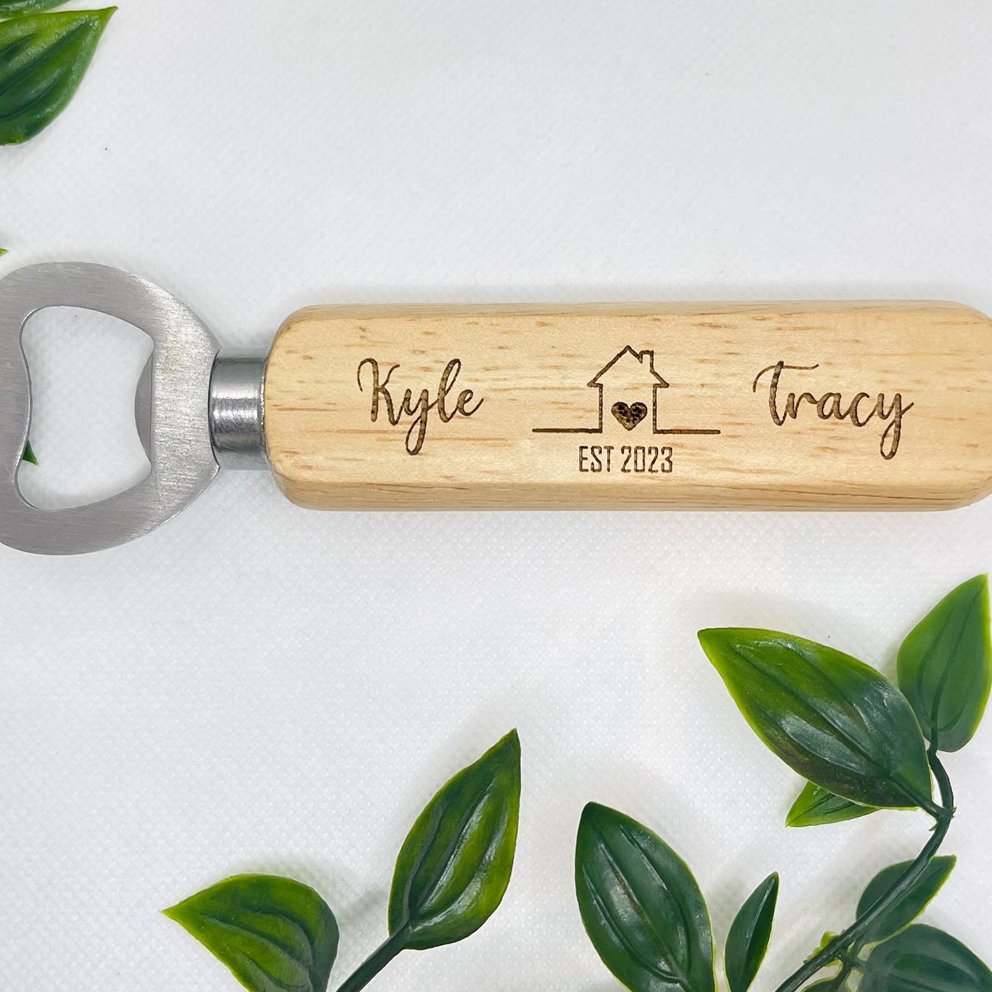 Personalised EST bottle opener, what a wonderful gift for a housewarming / couple prezzie. Laser engraved in house. Each bottle opener personalised with the couples name in this special font, please have a look at the picture for A-Z’s for reference.