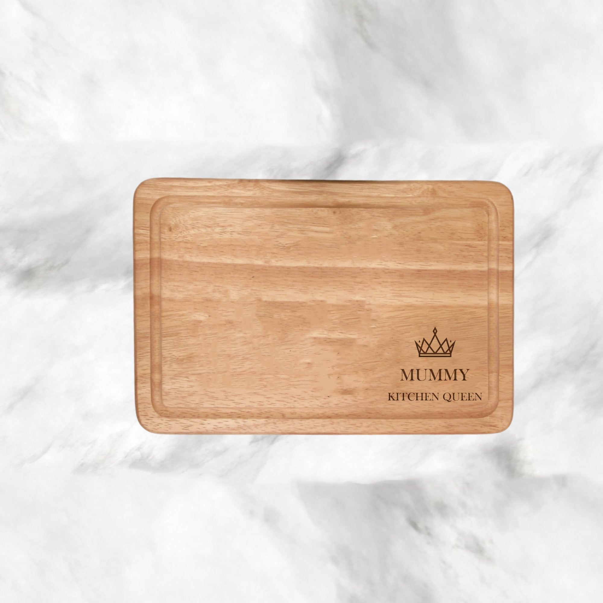 Elevate your kitchen with our Personalised Chopping Board Queen Crown Right Hand Side Design, a regal tribute to the Queen of the kitchen. Measuring 300x200mm, this premium wood board allows you to engrave two lines of text (max 20 characters each), making it an exquisite gift for birthdays, Mother’s Day, weddings, Christmas, or just to show appreciation. Crafted with precision, this board seamlessly combines practicality and sentiment, enhancing your culinary experience with personalized perfection.