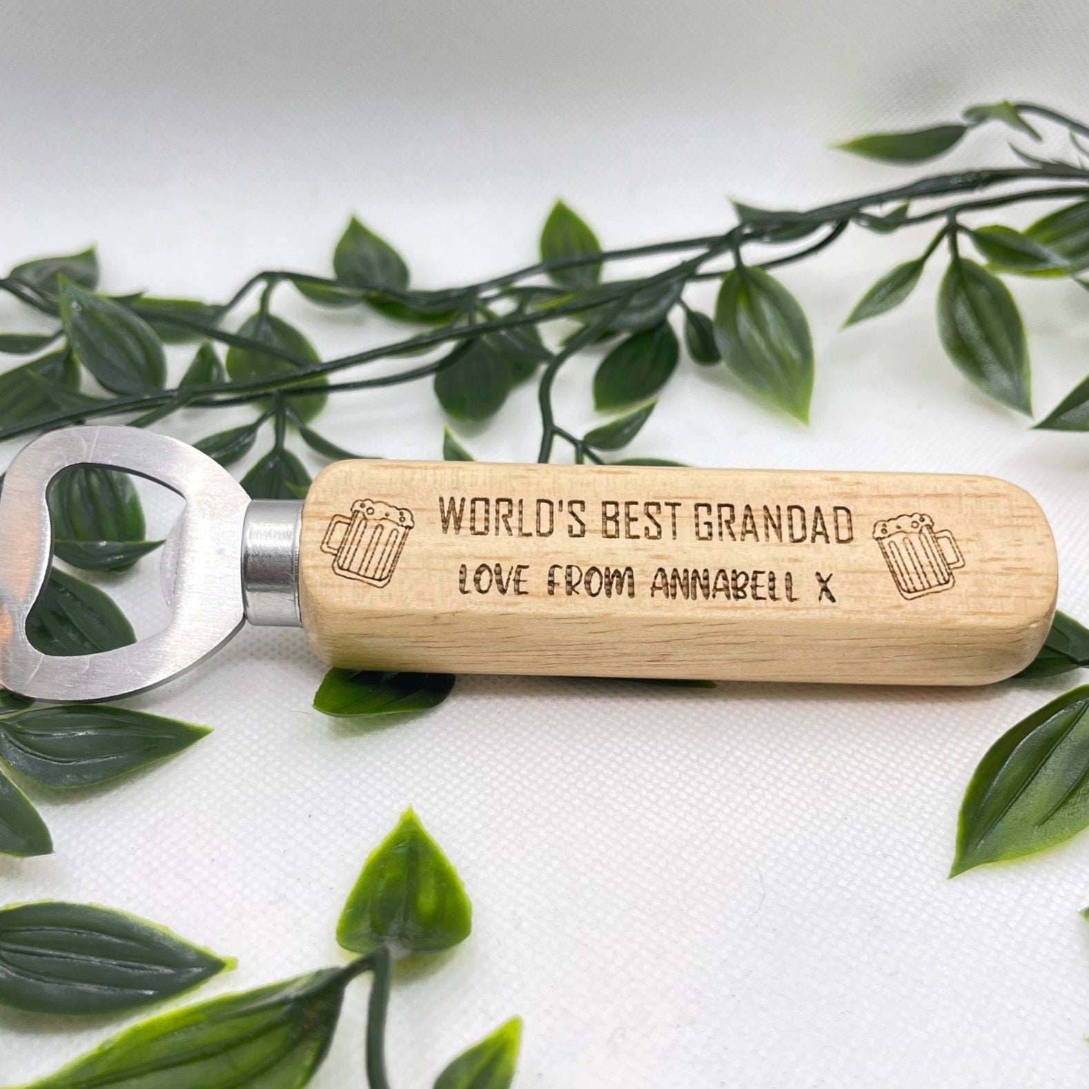 Stylish Personalised Wooden Bottle Opener - Crafted from premium wood and stainless steel - Customise with 'World's Best' engraving - Add a special 'love from' message - Whimsical beer jug icon - A thoughtful and unique gift for any occasion.