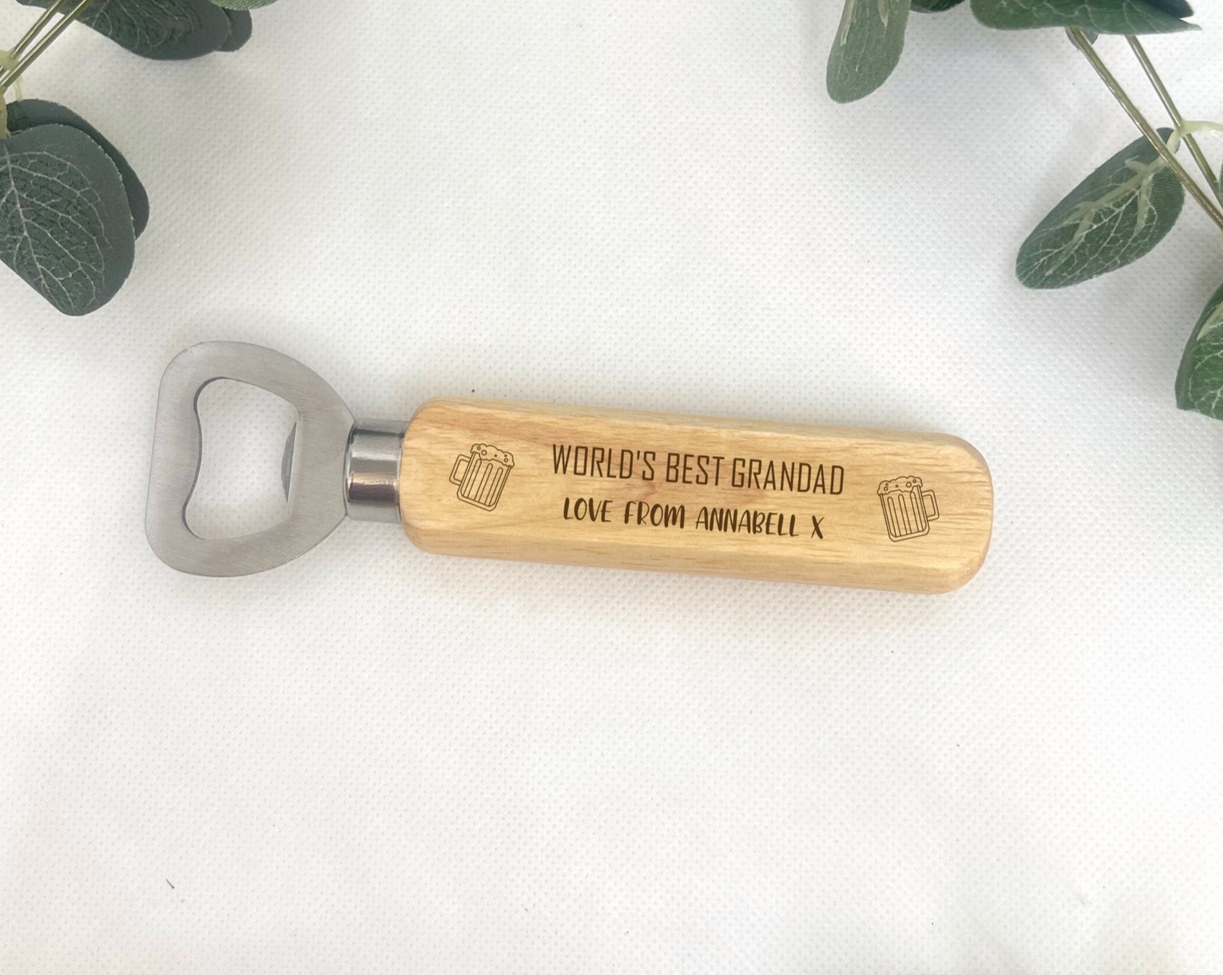 Personalised Wooden Bottle Opener - Handcrafted from top-quality wood and stainless steel - Customisable 'World's Best' engraving - Add a heartfelt 'love from' message - Charming beer jug icon - The perfect gift for Dad, Uncle, Grandfather, or any loved one.