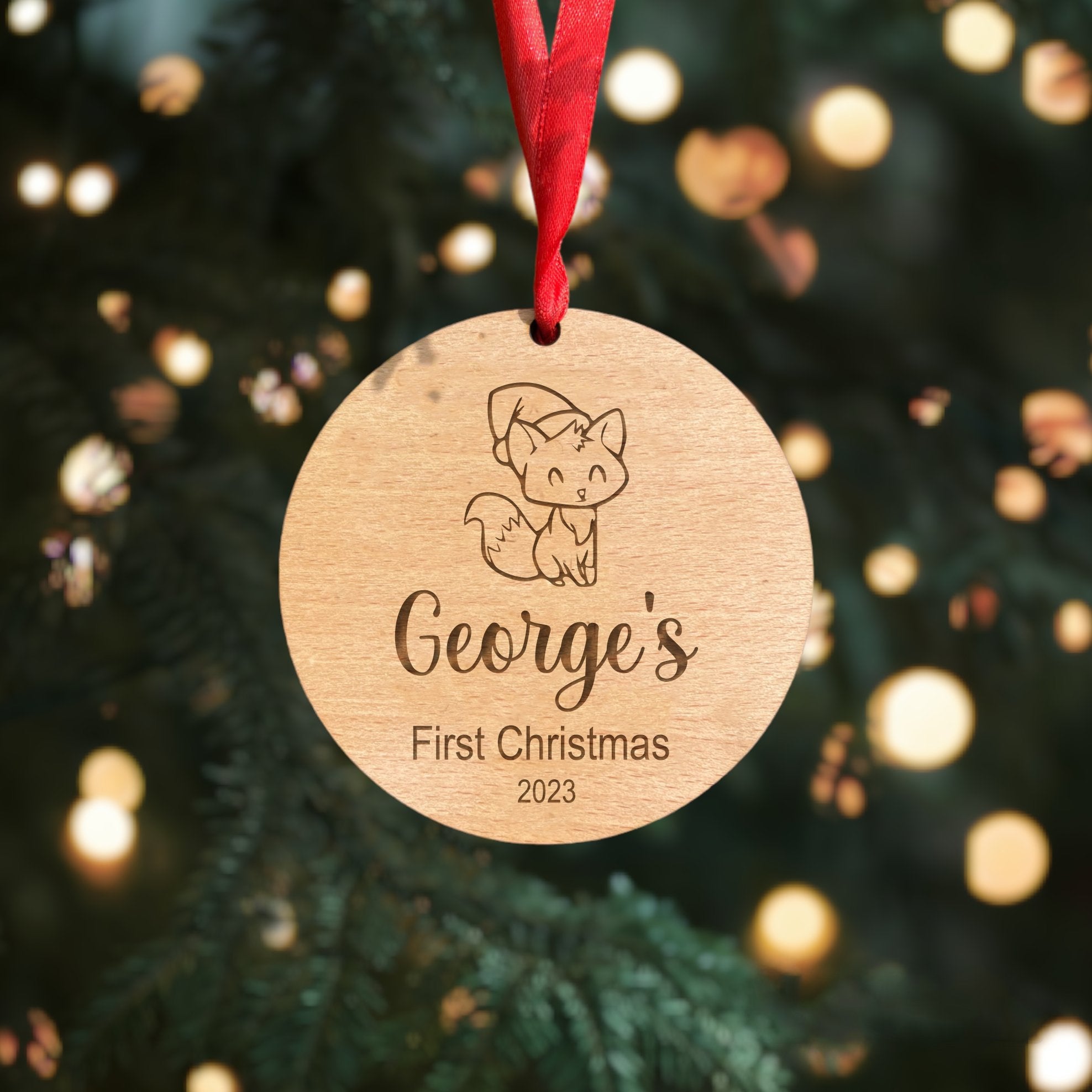 Adorable Fox Design Personalized Baby's First Christmas Bauble - Crafted from Real Beech Veneer Wood, Customized with Your Baby's Name and This Year's Date. Add a Touch of Whimsy to Your Baby's First Holiday Season.