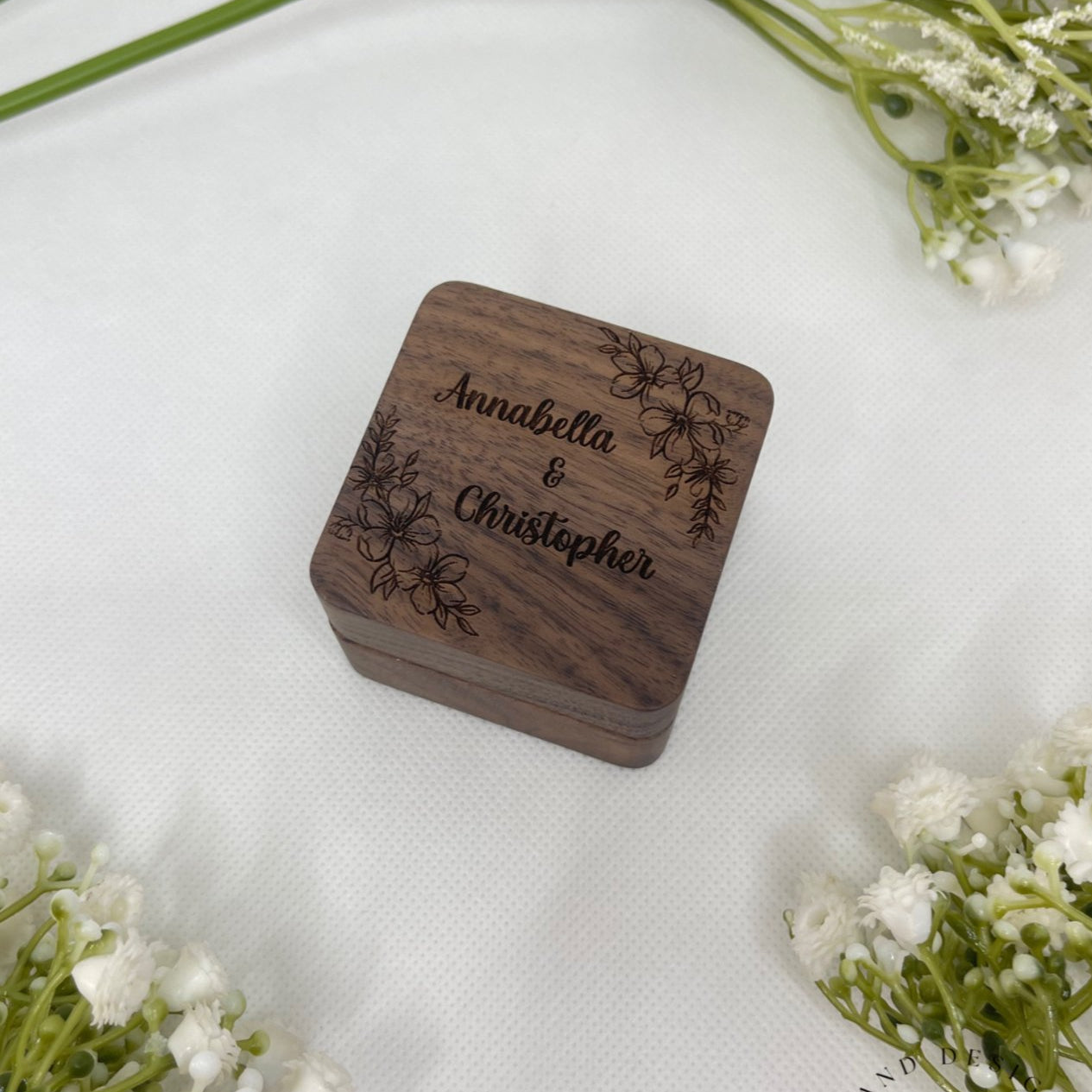 Personalised Double Slot Wooden Ring Box.  This rustic ring box is perfect for you and your soon to be.   Personalise your ring box with two names of your choice. (max characters per name is 15)  Size - Size: 5.5*5.5*4 cm