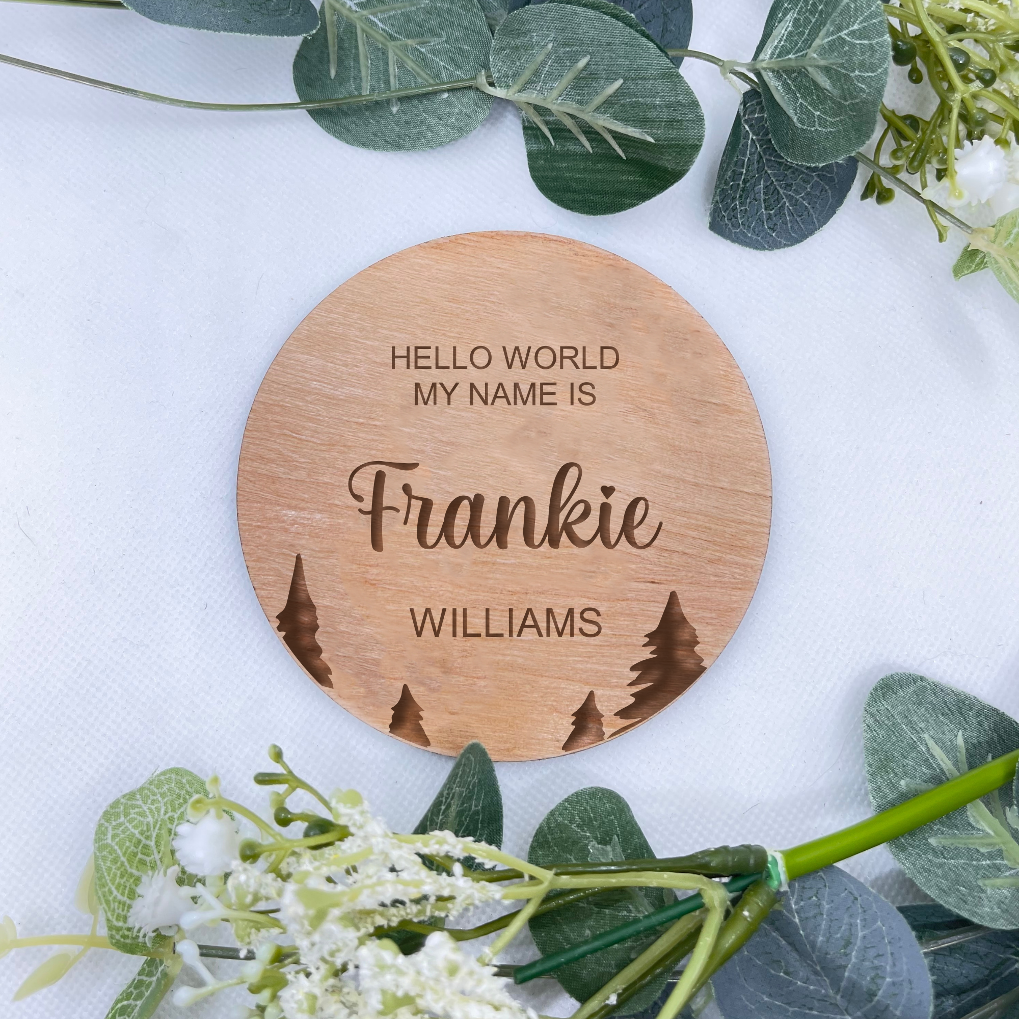 A beautifully crafted personalised pregnancy announcement sign featuring an elegant tree design, made from high-quality beech veneer, perfect for welcoming your new arrival.