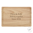 Fun and distinctive Personalised Wooden Cutting Board with exquisite engraving and a convenient groove for drips. Perfect for food prep or display.