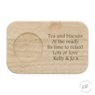 An engraved tea and biscuit board crafted from durable wood, featuring a slot for a tea or coffee cup. Personalised with custom engraving, perfect for birthdays, anniversaries, or Christmas gifts.