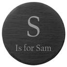 Enhance your dinner table with these elegant Engraved Round Slate Coasters featuring personalized family member names. Each coaster, showcasing unique natural slate patterns, comes with protective rubber feet to prevent scratches. Personalize with an initial and custom text for a thoughtful, stylish gift.