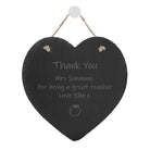 Heart-shaped natural slate piece with rustic string, personalised with engraved words. Ideal gift for a teacher who inspired or helped achieve academic goals. Charming and elegant, suitable for home or classroom display.