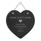 Engraved Large Home Sweet Home Slate Heart - A heart-shaped piece of natural slate featuring the engraved phrase "Home Sweet Home" within a decorative border. It hangs from a rustic rope loop and has space below the main phrase for personalized names and a message. The slate showcases its unique texture and natural variations.