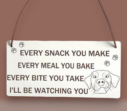 Plaque Size: 220 x 110 mm (approx) Thickness: 3mm Text reads: Every snack you make every meal you bake every bite you take i'll be watching you Suitable For: Dog Signs For Home, Gifts For Dog Lovers, Dog Signs And Plaques, Funny Dog Sign, Birthday Gift Style: Contemporary Material: White coated MDF with brown faux leather hanger Indoor use only Made in England
