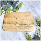 The Engraved Tea & Biscuit Board, designed for practicality and style, with an integrated cup slot and ample biscuit space, personalized with any message, ideal for special occasions.