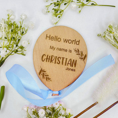 This is a lovely way to announce the arrival of your new beautiful baby to friends and family,  Personalise your plaque with your baby's name. At the top of this product it says hello world my name is, this is a balloon shaped  wooden product with ribbon colour of your choice, blue or pink..  This would make the perfect first gift for new parents. A beautiful addition to any baby photographs.  