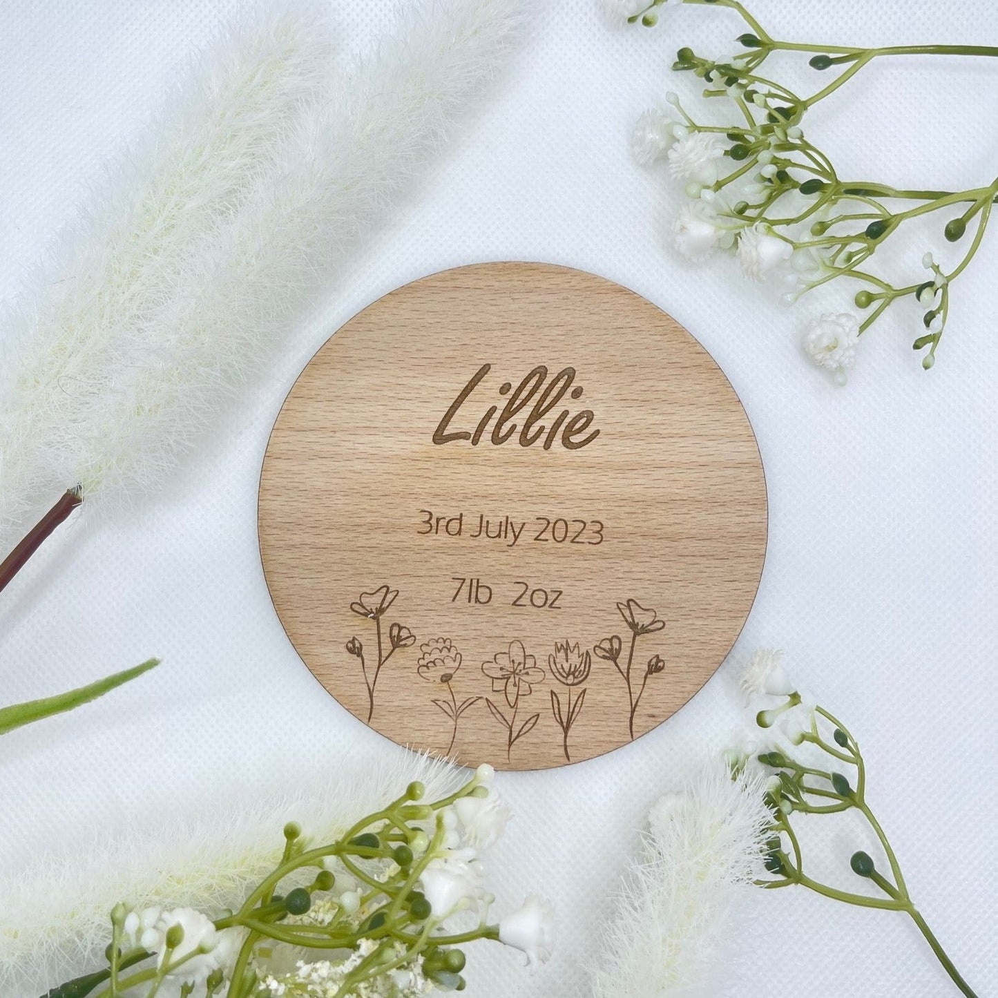 Wooden Sign with Personalised Engraving , Baby Name Announcement disc. This is a great gift for friends or family with a new baby. Engrave with name,date of birth & weight of the baby. with a  flower design at the bottom of the disc, this is made from 4mm wood.