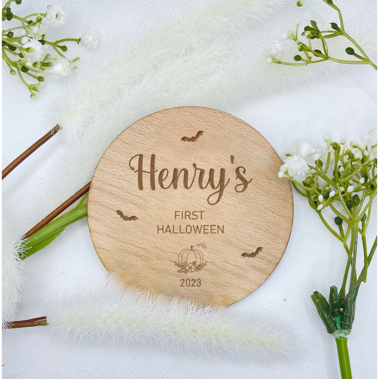 Baby's First Halloween Keepsake: Commemorate your little one's first Halloween with our personalised cherry wood plaque. Engraved with cute bats & pumpkin and customized with your baby's name, this cherished keepsake holds a special memory. Choose from 10x10cm or 15x15cm (approx.) size, crafted from 4mm thick cherry veneer. Capture the enchantment of this milestone occasion. Please be mindful that this item is not intended for use by children, and adult supervision is required.