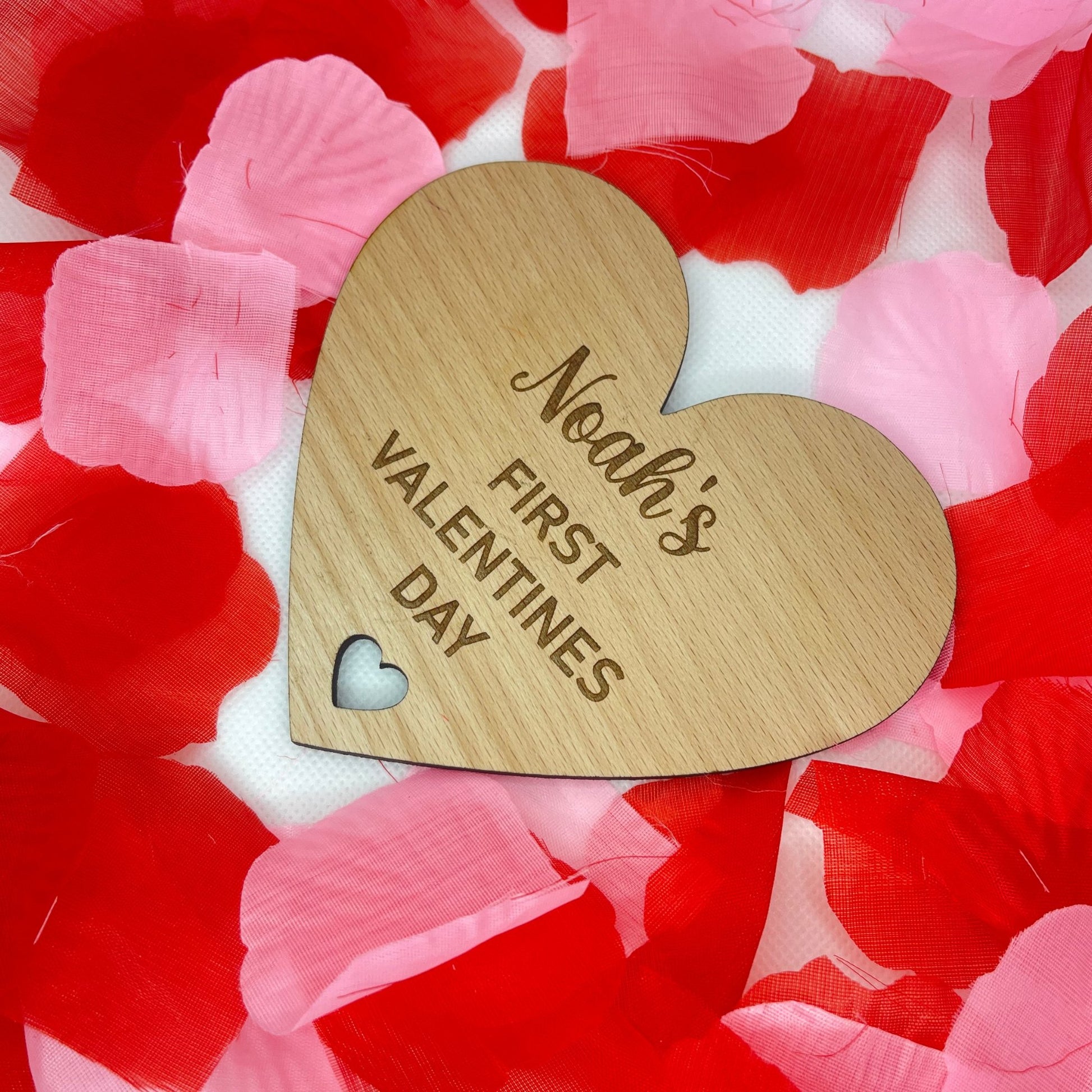 This is a lovely way to announce the arrival of your new beautiful baby to friends and family, Personalise your plaque with your baby's name. At the top of this product it says your babys name with first valentine's day after, this is a heart shaped wooden product. This would make the perfect first gift for new parents. A beautiful addition to any baby photographs.