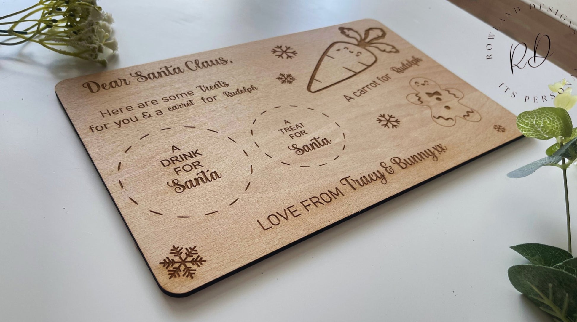 Make Christmas Eve extra special with our Personalised Santa Plate. Customisable for up to three names, complete with dedicated sections for Santa's treats, drink, and Rudolf's carrot, embellished with delightful gingerbread and snowflake engravings. Crafted from 4mm beech veneer, sized at 290mm x 185mm.
