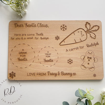 Add a touch of magic to your Christmas Eve with our Personalised Santa Plate. Customized with up to three names, featuring sections for Santa's treat, drink, and Rudolf's carrot, all beautifully engraved with gingerbread and snowflakes. Crafted from 4mm beech veneer, measuring 290mm x 185mm.