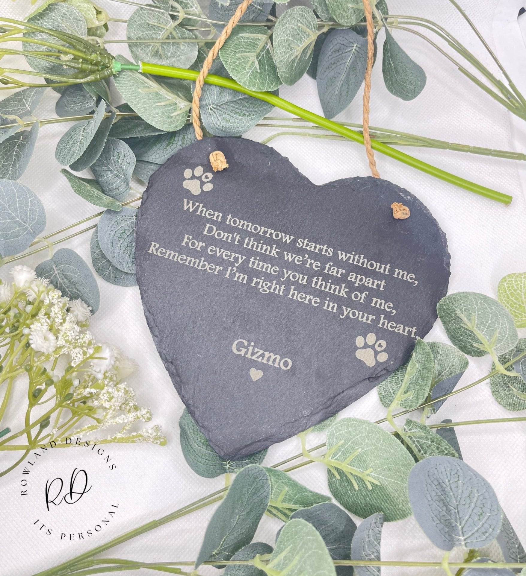 Slate heart hanging sign, engraved with the words, When tomorrow starts without me, don't think we're far apart for every time you think of me, remember i'm right here in your heart. with your personalised name at the bottom. the left & right of this heart has dog paw prints.  This mesures H14cm x W15cm