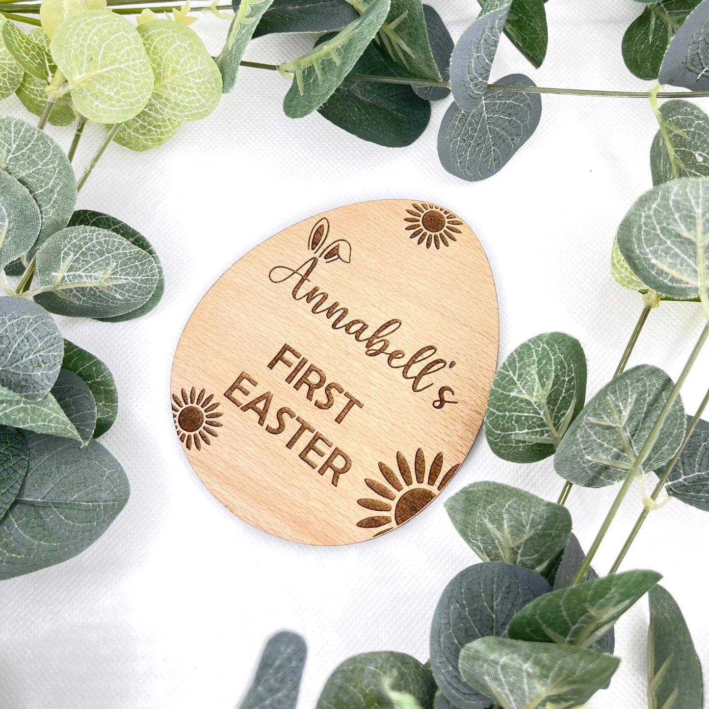  Personalise your plaque with your baby's name. At the top of this product it says your babys name with first easter after, this is a egg shaped wooden cherry veneer 4mm, SIZE: 107mm X 87mm (approx) . This would make the perfect first gift for new parents. A beautiful addition to any baby photographs.Easter style gift.