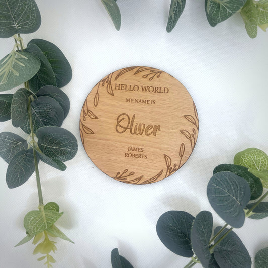 Personalise your plaque with your baby's first middle & last name .  This is round with a beautiful leaf design around the edge on the rounded plaque . This would make the perfect first gift for new parents. A beautiful addition to any baby photographs.     Made from: Oak veneer  SIZE: 10x10cm or 15x15cm (approx)   Thickness: 4mm