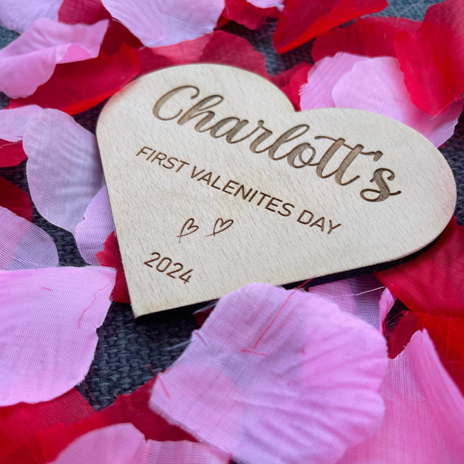 Capture the joy of your baby's first Valentine's with a personalised heart-shaped announcement plaque. Crafted from durable beech veneer, measuring 115mm x 100mm with a 4mm thickness – a thoughtful and timeless gift for new parents.