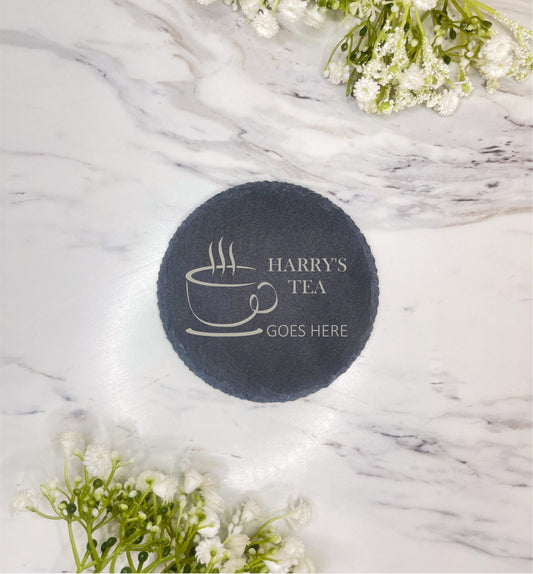 Personalised laser-engraved round slate coaster with custom name and coffee cup design, a charming and practical gift idea for coffee lovers